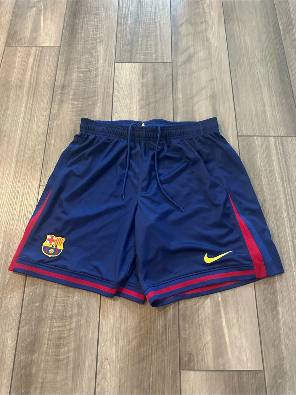 Nike Blue FC Barcelona Shorts with Red Trim and Yellow Swoosh